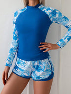 Conjunto UV Feminino Folhagens Tropicais