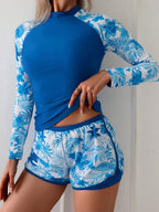 Conjunto UV Feminino Folhagens Tropicais